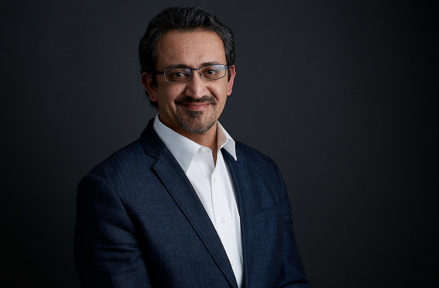 Dinesh Khanna's headshot